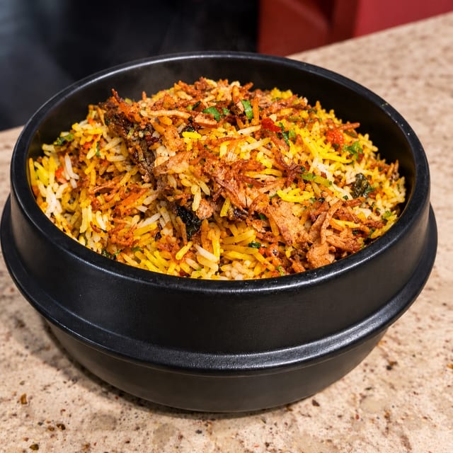 Dum Chicken Biryani.